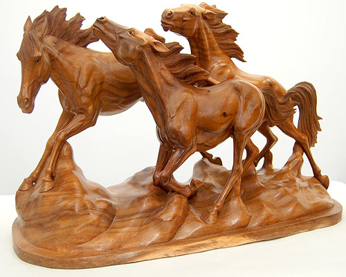 wood carved horses